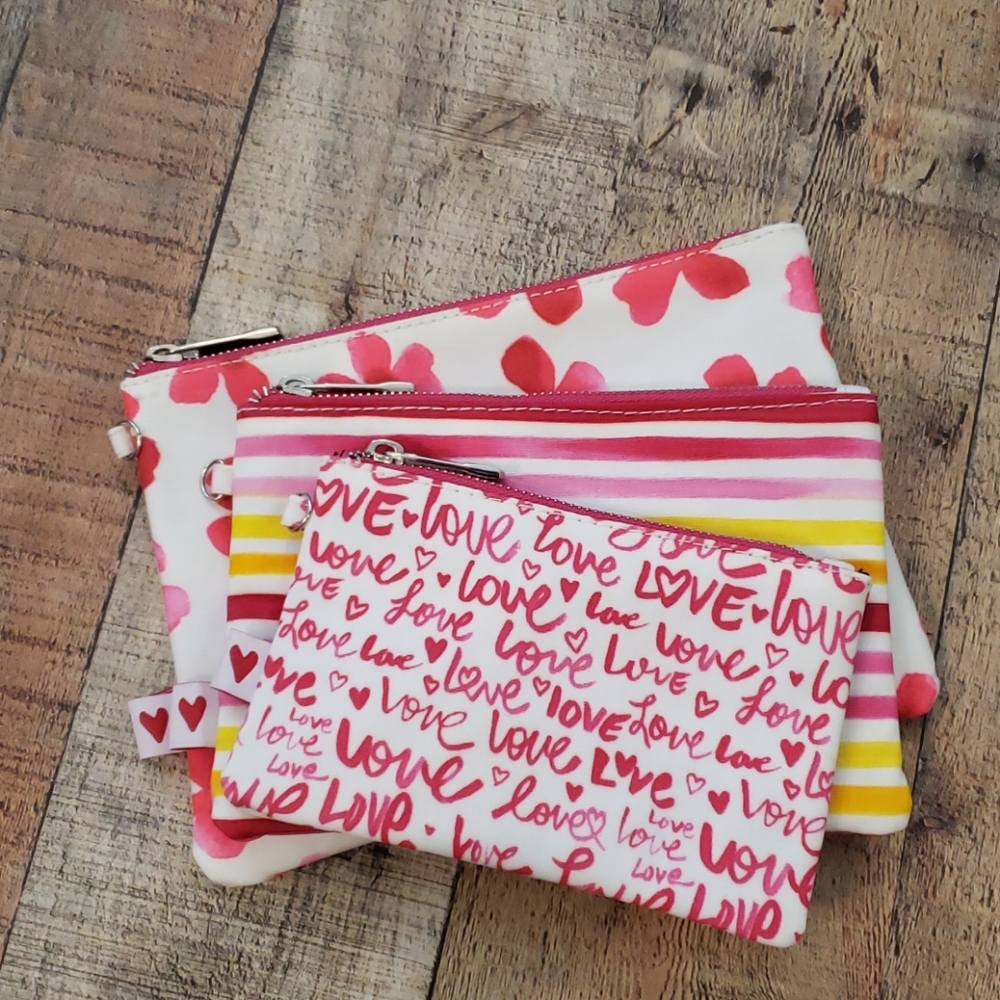 3 NWOT  Bella J Cosmetic bags